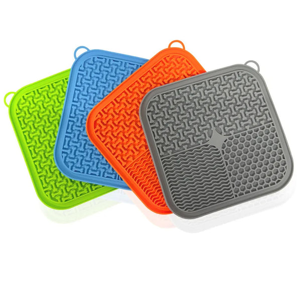 Four silicone lick mats showing the ridged licking surface
